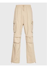 Karl Kani Spodnie materiałowe Rubber Signature 6002506 Beżowy Relaxed Fit. Kolor: beżowy. Materiał: bawełna