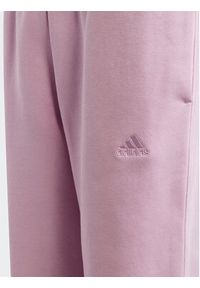 Adidas - adidas Spodnie dresowe Fleece Kids IJ5953 Różowy Loose Fit. Kolor: różowy. Materiał: bawełna #5