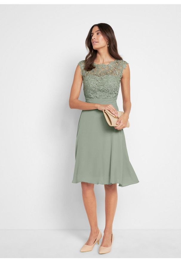 bonprix - Sukienka mini z koronką. Kolor: zielony. Materiał: koronka. Wzór: koronka. Styl: elegancki. Długość: mini