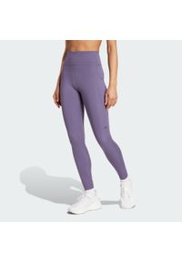Adidas - Legginsy Own the Run 7/8. Kolor: fioletowy. Materiał: materiał. Wzór: gładki. Sport: bieganie