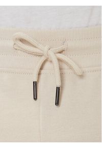TOMMY HILFIGER - Tommy Hilfiger Spodnie dresowe UM0UM03664 Écru Regular Fit. Materiał: bawełna #3