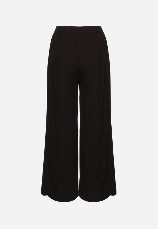 Born2be - Czarne Bawełniane Szerokie Spodnie Alladynki z Wysokim Stanem i Gumką w Talii Risalles. Okazja: na co dzień. Stan: podwyższony. Kolor: czarny. Materiał: bawełna. Styl: casual, elegancki