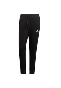 Adidas - Spodnie męskie adidas Essentials Tapered Cuff Pants. Kolor: biały, czarny, wielokolorowy