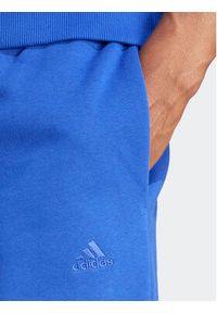 Adidas - adidas Spodnie dresowe ALL SZN IW1186 Niebieski Regular Fit. Kolor: niebieski. Materiał: bawełna #6