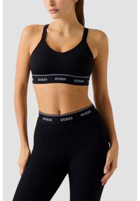Guess - GUESS Czarny damski stanik sportowy Alba, Rozmiar XL. Okazja: na co dzień. Kolor: czarny. Styl: sportowy #1