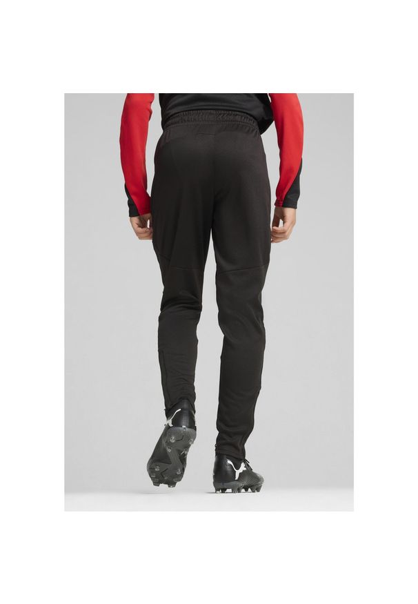 Puma - Młodzieżowe spodnie treningowe AC Milan PUMA Black For All Time Red. Kolor: czerwony, wielokolorowy, czarny