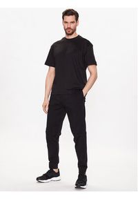 Calvin Klein Spodnie dresowe Logo K10K111205 Czarny Relaxed Fit. Kolor: czarny. Materiał: bawełna, dresówka, syntetyk #3