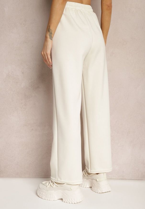Renee - Jasnobeżowe Spodnie High Waist o Szerokich Prostych Nogawkach z Gumką w Pasie Hintia. Okazja: na co dzień. Stan: podwyższony. Kolor: beżowy. Styl: elegancki, casual