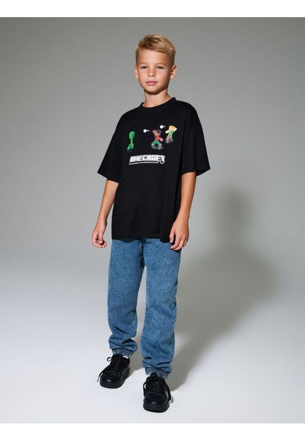 Sinsay - Ocieplane spodnie jogger z polarem wewnątrz - niebieski. Kolor: niebieski