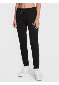Calvin Klein Jeans Spodnie dresowe Blend Fleece J20J212872 Czarny Regular Fit. Kolor: czarny. Materiał: dresówka, bawełna, syntetyk