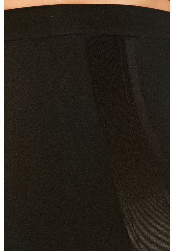 Spanx - Figi modelujące Oncore High-Waist. Stan: podwyższony. Kolor: czarny. Materiał: tkanina. Wzór: gładki