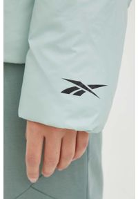 Reebok kurtka puchowa damska kolor zielony zimowa. Okazja: na co dzień. Kolor: zielony. Materiał: puch. Sezon: zima. Styl: casual #4