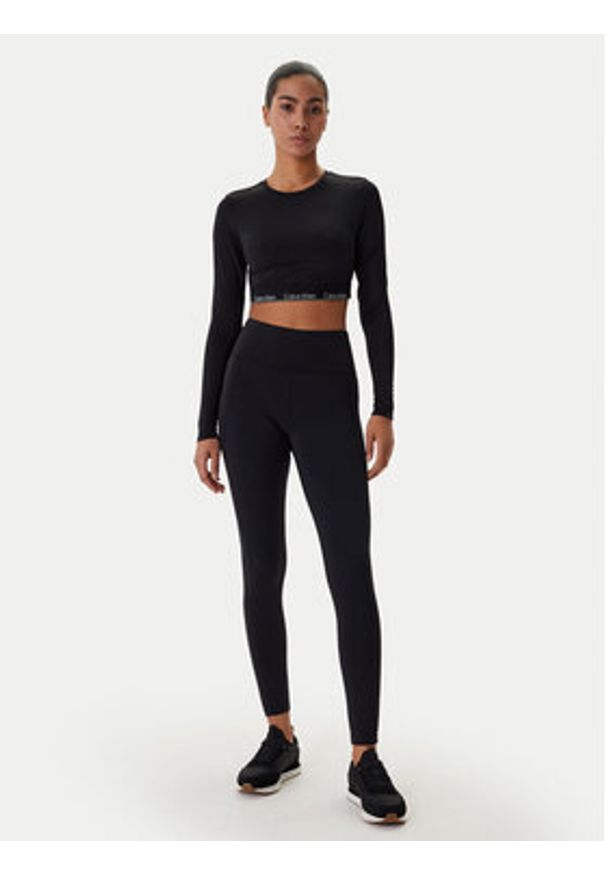 Calvin Klein Swimwear Bluzka LV00Q61128 Czarny Slim Fit. Kolor: czarny. Materiał: syntetyk