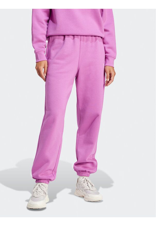 Adidas - adidas Spodnie dresowe Essentials IR5964 Różowy Regular Fit. Kolor: różowy. Materiał: bawełna
