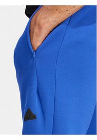 Adidas - adidas Spodnie dresowe Z.N.E. Premium IR5206 Niebieski Regular Fit. Kolor: niebieski. Materiał: bawełna, syntetyk #5