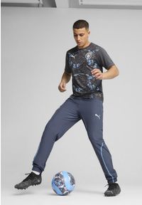 Puma - Męska koszulka przedmeczowa Manchester City PUMA Strong Gray Cool Light. Kolor: szary. Wzór: nadruk