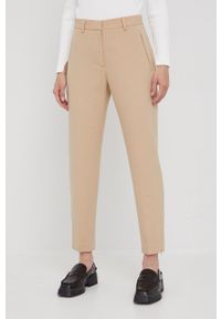 Calvin Klein spodnie z domieszką wełny damskie kolor beżowy proste high waist. Okazja: na co dzień. Stan: podwyższony. Kolor: beżowy. Materiał: wełna. Styl: casual