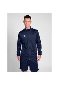 Kurtka z dresu Hummel Essential. Kolor: niebieski. Materiał: dresówka. Sport: fitness #1