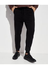 NANUSHKA - Czarne spodnie dresowy Shay. Kolor: czarny. Materiał: dresówka #9
