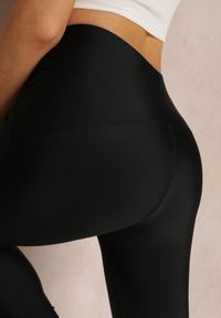 Renee - Czarne Legginsy Hyraste. Kolor: czarny. Materiał: dzianina. Długość: długie. Wzór: aplikacja. Styl: sportowy