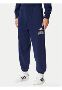 Adidas - adidas Spodnie dresowe Seasonal Essentials Collegiate French Terry Cuffed KG0521 Granatowy Regular Fit. Kolor: niebieski. Materiał: bawełna #1
