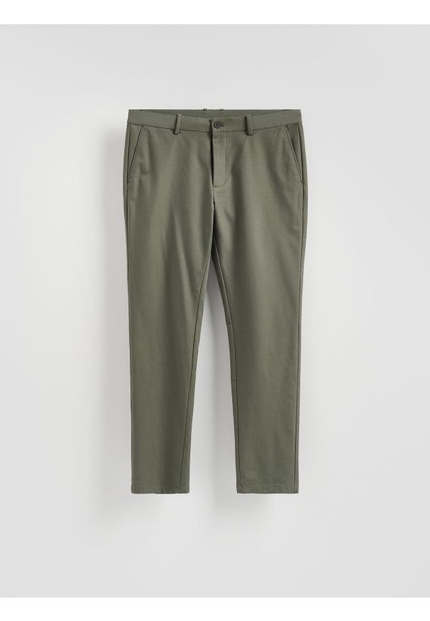 Reserved - Spodnie chino slim fit - jasny zielony. Kolor: zielony. Materiał: tkanina, wiskoza