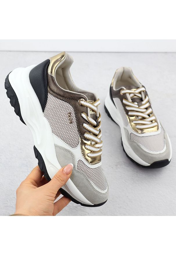 Skórzane sneakersy damskie beżowe eVento 8234. Kolor: beżowy. Materiał: skóra