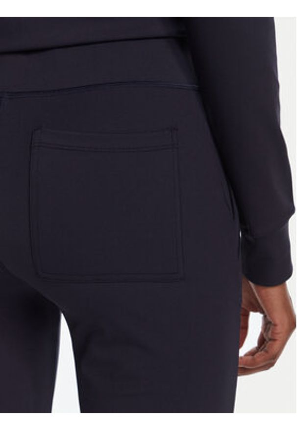 Juicy Couture Spodnie dresowe Active JCSML125403 Granatowy Flared Leg. Kolor: niebieski. Materiał: syntetyk