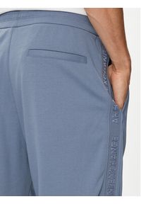 Armani Exchange Spodnie dresowe 6DZPLC ZJNNZ 15DU Niebieski Regular Fit. Kolor: niebieski. Materiał: bawełna #3