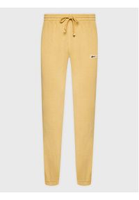 Reebok Spodnie dresowe Classics Natural Dye HK7088 Żółty Relaxed Fit. Kolor: żółty. Materiał: bawełna, dresówka