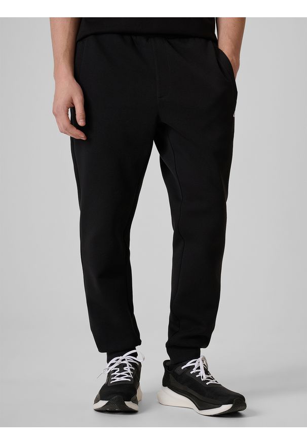 4f - 4F Spodnie dresowe joggery męskie - czarne S. Kolor: czarny. Materiał: dresówka