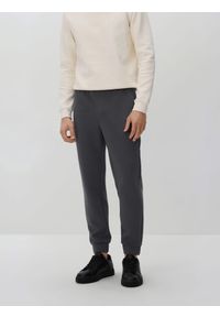 Reserved - Spodnie dresowe slim fit - szary. Kolor: szary. Materiał: dresówka