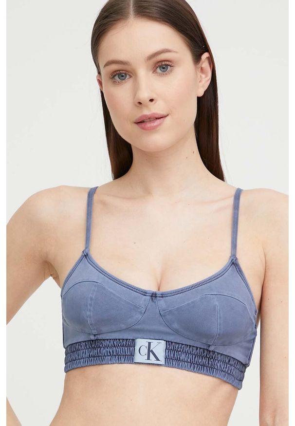 Calvin Klein biustonosz kąpielowy kolor granatowy lekko usztywniona miseczka. Kolor: niebieski