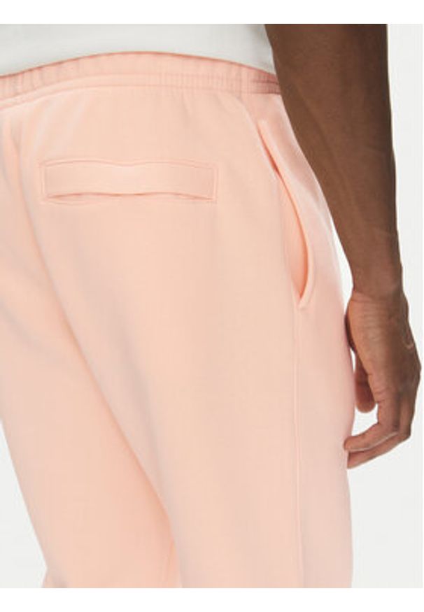 Nike Spodnie dresowe BV2671 Pomarańczowy Regular Fit. Kolor: pomarańczowy. Materiał: bawełna