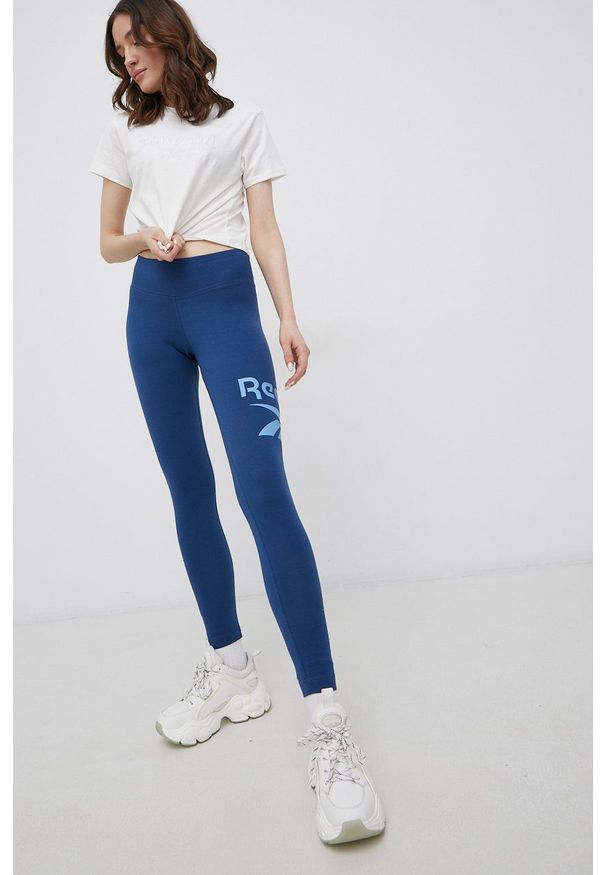 Reebok Legginsy damskie z nadrukiem. Kolor: niebieski. Wzór: nadruk