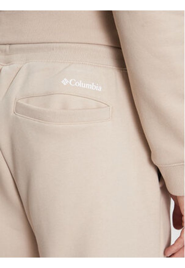 columbia - Columbia Spodnie dresowe Marble Canyon™ Heavyweight Fleece Pant Brązowy Regular Fit. Kolor: brązowy, beżowy. Materiał: bawełna, syntetyk