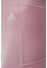 Adidas - adidas legginsy treningowe x Zoe Saldana HB1489 damskie kolor fioletowy gładkie. Kolor: fioletowy. Materiał: skóra, poliester, dzianina, materiał. Wzór: gładki. Sport: fitness