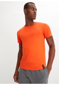 bonprix - T-shirt funkcyjny z siatkową wstawką. Kolor: pomarańczowy. Materiał: materiał. Styl: sportowy