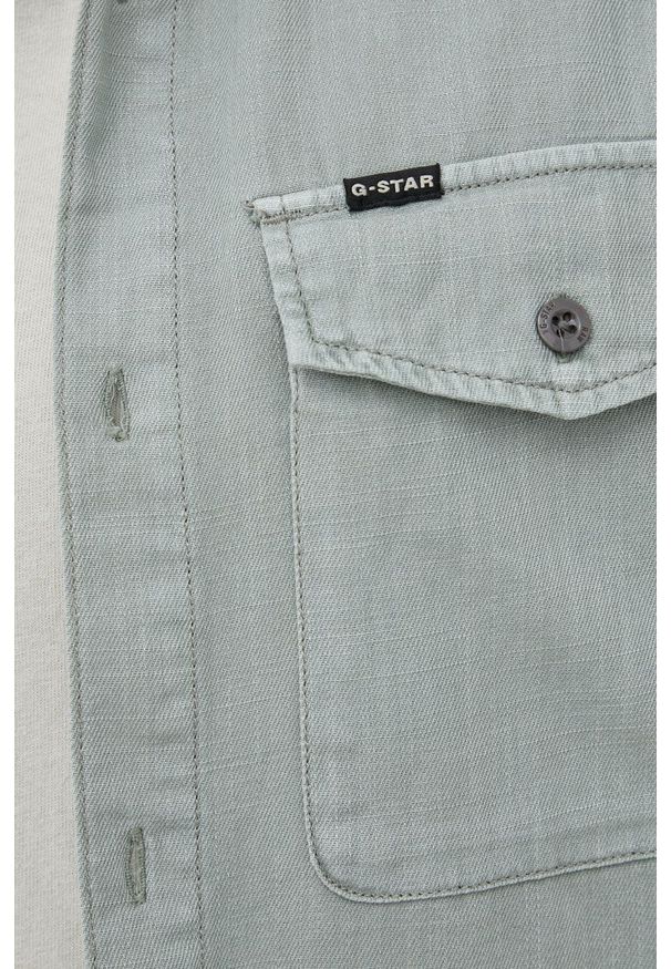 G-Star RAW - G-Star Raw koszula bawełniana męska kolor zielony slim z kołnierzykiem klasycznym. Typ kołnierza: kołnierzyk klasyczny. Kolor: zielony. Materiał: bawełna. Długość rękawa: krótki rękaw. Długość: krótkie. Styl: klasyczny