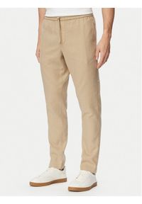 TOMMY HILFIGER - Tommy Hilfiger Chinosy Harlem MW0MW42336 Beżowy Regular Fit. Kolor: beżowy. Materiał: len #1