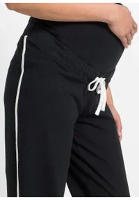 Spodnie dresowe ciążowe bonprix czarny. Kolekcja: moda ciążowa. Kolor: czarny. Materiał: dresówka #4