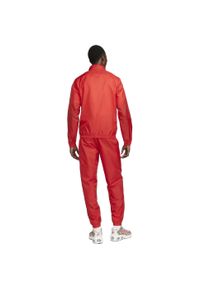 Dres Nike Sportswear Club, Mężczyźni. Kolor: czerwony. Materiał: dresówka. Sport: fitness