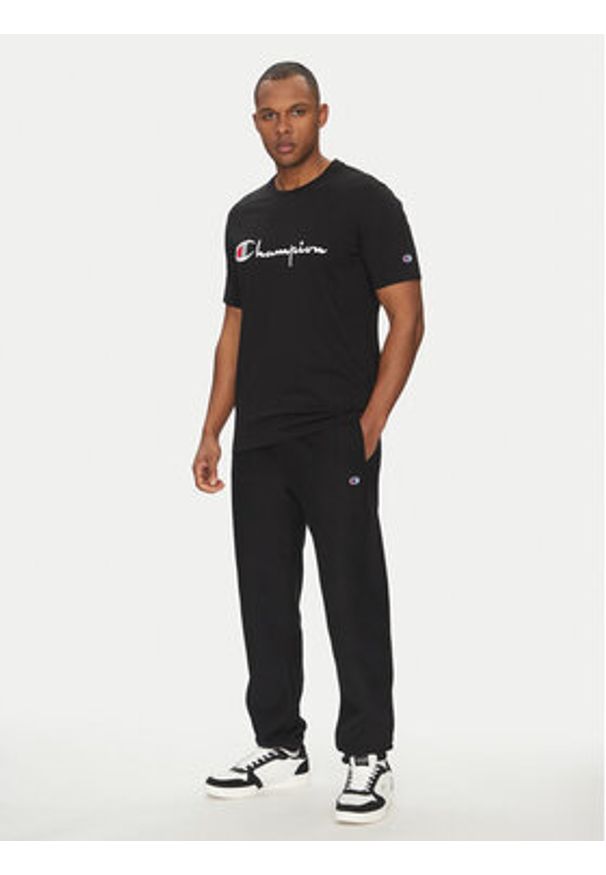 Champion Spodnie dresowe 221620 Czarny Regular Fit. Kolor: czarny. Materiał: bawełna