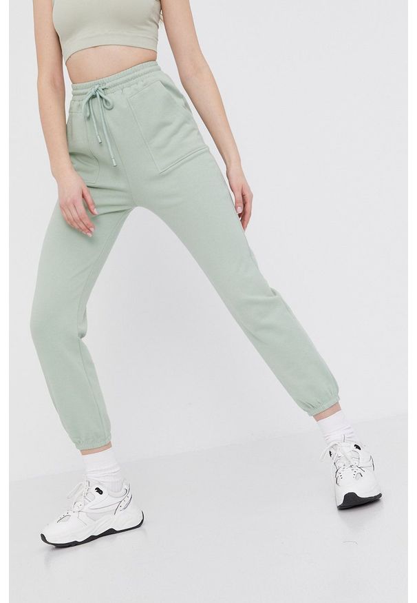 Answear Lab Spodnie damskie kolor zielony gładkie. Kolor: turkusowy. Materiał: dzianina. Wzór: gładki