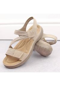 Komfortowe sandały damskie na rzepy z gumkami beżowe Rieker 64870-62 beżowy. Zapięcie: rzepy. Kolor: beżowy #6