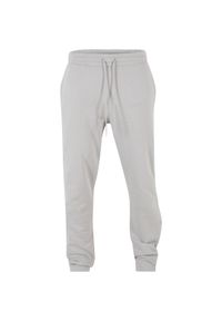Spodnie dresowe zapinany na guziki Urban Classics. Kolor: szary. Materiał: dresówka. Sport: bieganie #1