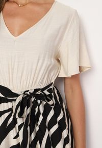 Born2be - Czarno-Biały Taliowany Kombinezon z Szerokimi Nogawkami i Paskiem w Talii Nellma. Okazja: na co dzień. Kolor: czarny. Materiał: wiskoza. Długość rękawa: krótki rękaw. Długość: krótkie. Styl: casual, elegancki #6