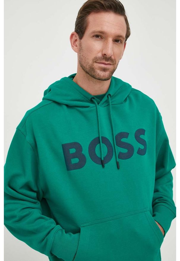 BOSS Orange - BOSS bluza bawełniana BOSS ORANGE męska kolor zielony z kapturem z nadrukiem. Typ kołnierza: kaptur. Kolor: zielony. Materiał: bawełna. Wzór: nadruk