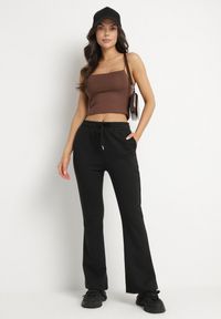 Born2be - Czarne Spodnie Dresowe o Kroju Dzwonów z Gumką w Talii Efravella. Okazja: na co dzień. Kolor: czarny. Materiał: dresówka. Styl: elegancki, casual #7