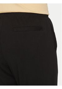 Champion Spodnie dresowe 220305 Czarny Straight Fit. Kolor: czarny. Materiał: bawełna